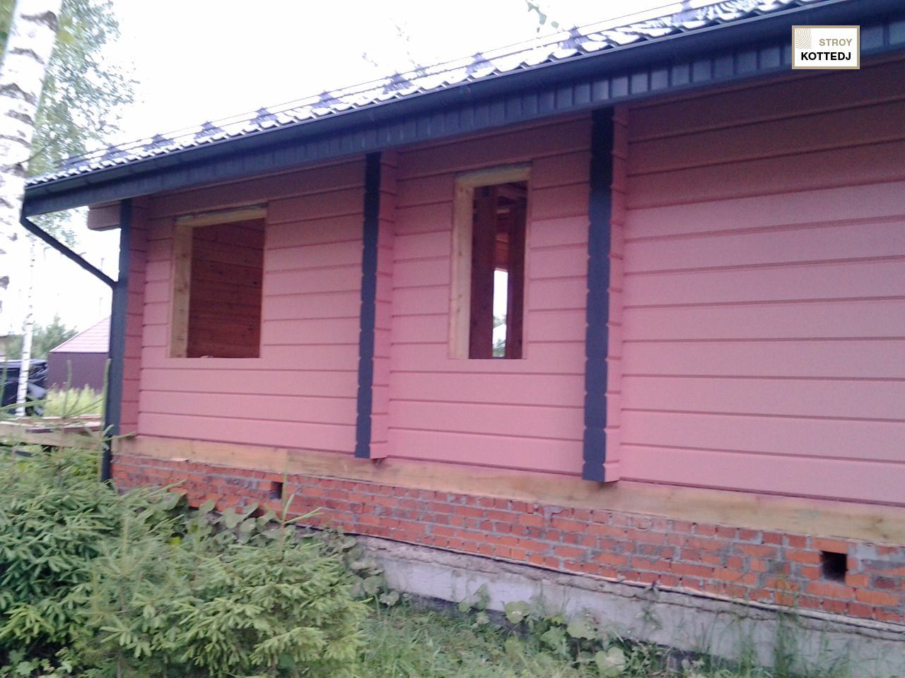 Розовый дом из клееного бруса